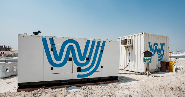 WJ Middle East News: Construction site with equipment containers.